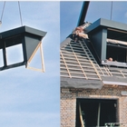 afbeelding: Prefab dakkappel bekleding trespa met kraan plaatsen op prefab kap dagklus.